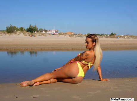 Bikini Fanatics invites you to browse their xxx photos with Daisy Lee exhibit sexy body